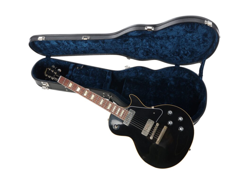 Noel Gallagher's handwritten lyrics for Oasis hit Don't Look Back in Anger sold for £20,160 at auction, five times the estimate, alongside rare band memorabilia in London.