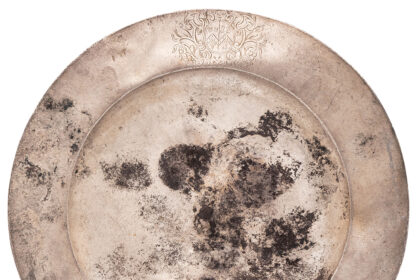 A silver plate linked to Admiral Sir Cloudesley Shovell’s final meal before the 1707 Scilly shipwreck is up for auction, marking a tragic yet historic maritime relic.