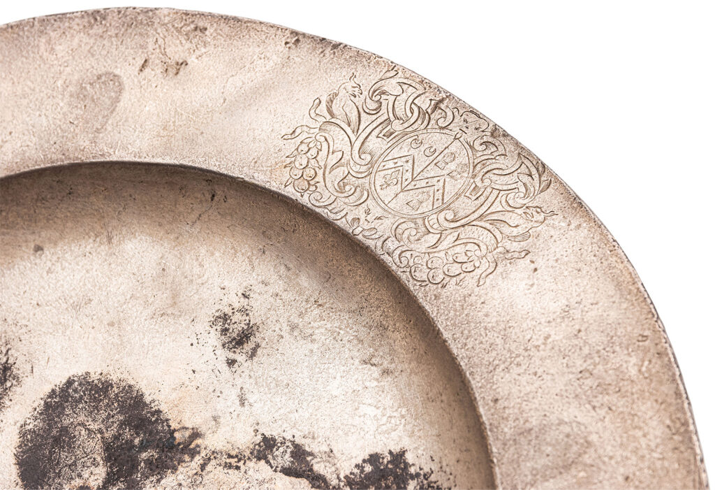 A silver plate linked to Admiral Sir Cloudesley Shovell’s final meal before the 1707 Scilly shipwreck is up for auction, marking a tragic yet historic maritime relic.