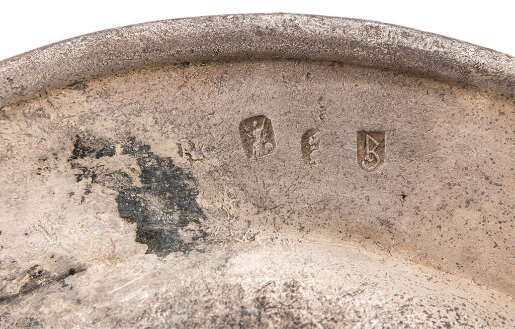 A silver plate linked to Admiral Sir Cloudesley Shovell’s final meal before the 1707 Scilly shipwreck is up for auction, marking a tragic yet historic maritime relic.