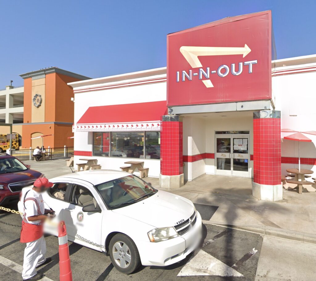 A pet python named Henry was reunited with her family after astonishingly turning up at an In-N-Out drive thru 40 miles from home leaving staff and customers stunned.