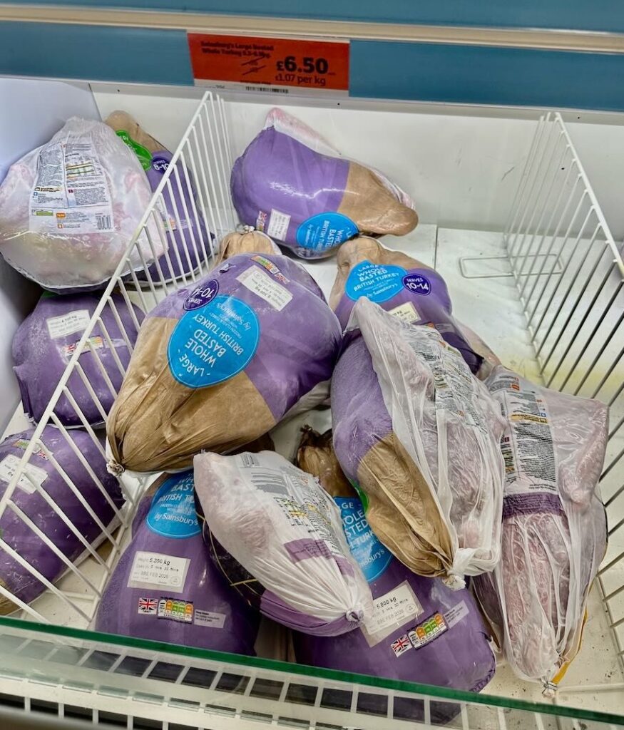 A savvy dad revealed how he preps Christmas dinner nearly a year early saving 75 percent by stocking up on yellow sticker deals turkeys and desserts months in advance.