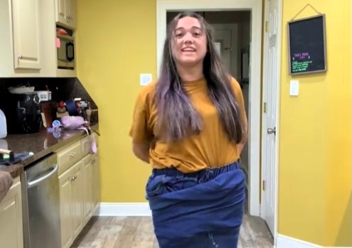 A mum was left in stitches after her Shein jeans arrived so oversized she could fit both legs into one, but she got a full refund and vowed to stick to tops instead of trousers next time.