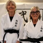 Two women, both aged 79, have earned their black belts in karate after just five years of training. Beryl Bellamy and Susie McPherson from Somerset passed a gruelling six-hour grading at Nishikan Martial Arts in Wincanton.