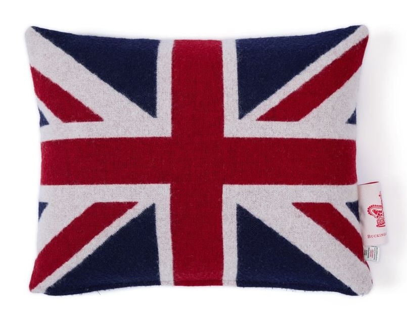 King Charles is selling a £95 merino wool Union Jack cushion, sparking debate over whether it’s a pricey royal indulgence or a cosy nod to British pride.