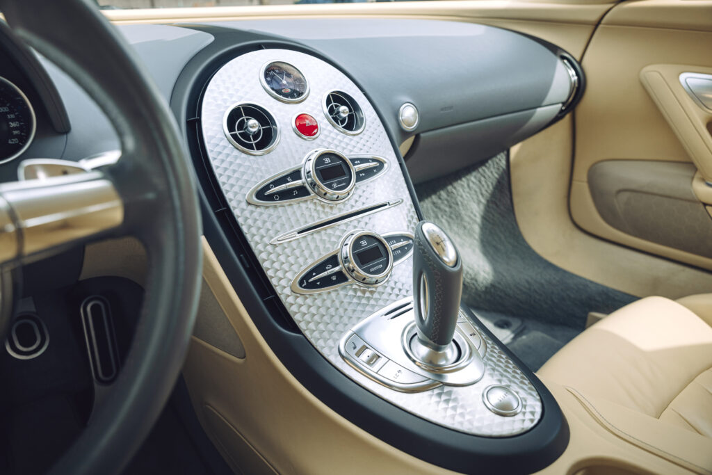 A rare 2008 Bugatti Veyron Pur Sang with mirror-polished aluminium body and 252mph top speed is set for auction at £1.9m, offering pure artistry and performance.