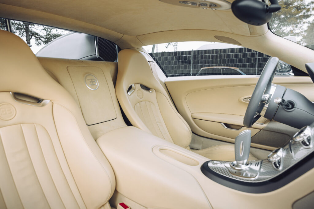 A rare 2008 Bugatti Veyron Pur Sang with mirror-polished aluminium body and 252mph top speed is set for auction at £1.9m, offering pure artistry and performance.