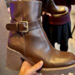 Shopper Gem Pesce was stunned after discovering her £19.99 TK Maxx boots were actually from Primark, with a hidden logo revealed under a fake Boonchy label after one wear.