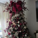 Christmas superfan Charlotte Chandler, 36, from Stockport, has already filled her home with five Christmas trees and festive lights, saying decorating early helps her arthritis and keeps her dad’s memory alive despite online trolls.