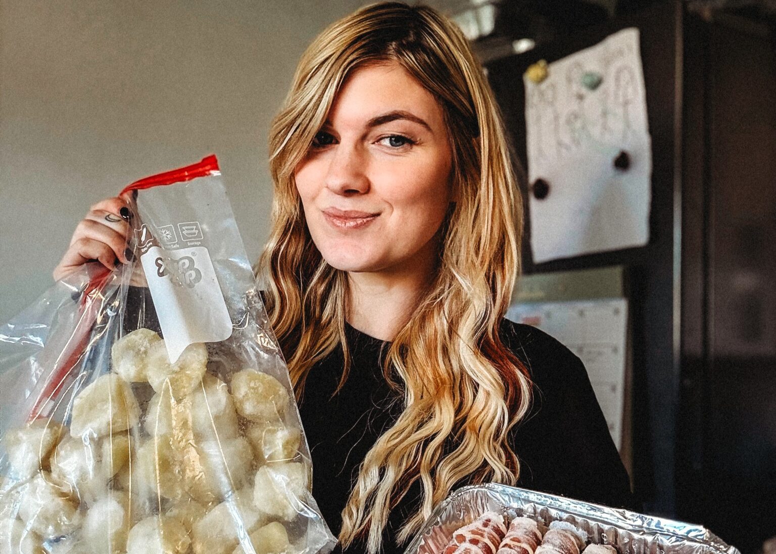 Mum Hannah Lumber cooks her entire Christmas dinner in November freezes it then reheats on the day saying it saves hours of stress tastes banging and lets her enjoy family time fully.