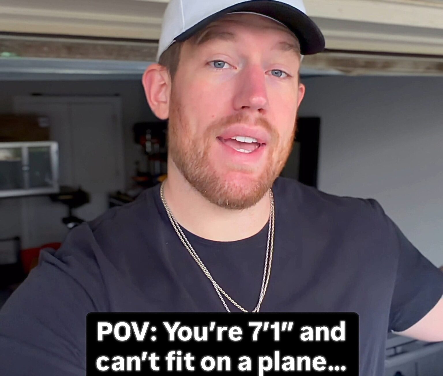 A 7ft 1in man who struggles to fit on planes was stunned when a kind passenger gave up her seat - easing his travel stress and earning praise from millions online.
