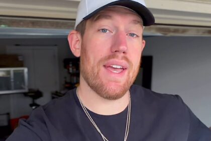 A 7ft 1in man who struggles to fit on planes was stunned when a kind passenger gave up her seat - easing his travel stress and earning praise from millions online.