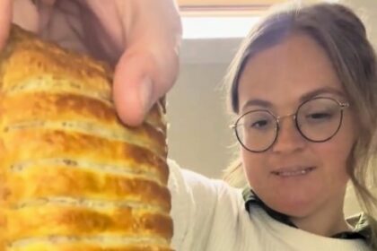 American expat Stacey Gaw tries Greggs for the first time but sparks backlash for heating the food and serving it on a plate as she reviews sausage rolls melts and festive favourites while adapting to UK culture.