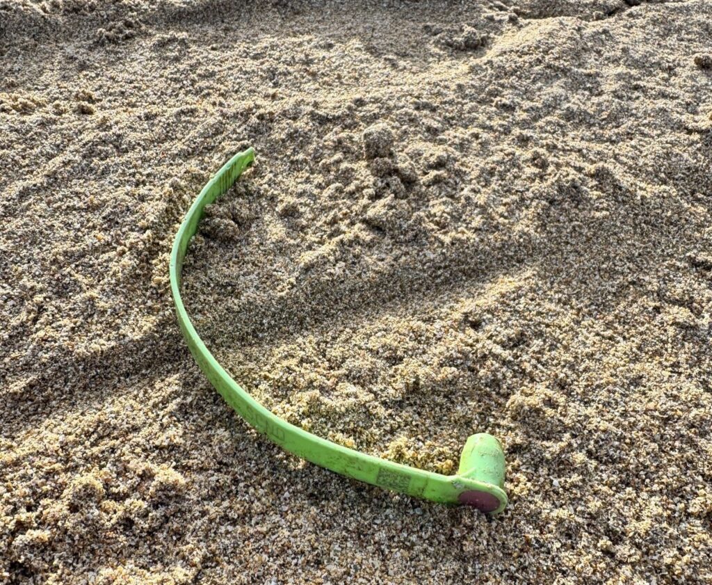 A beach cleaner found decades old litter on Fistral Beach including a 52 year old crisp packet a 1930s Cooltan tube and a lobster tag that travelled 3,000 miles highlighting ocean waste’s long life.