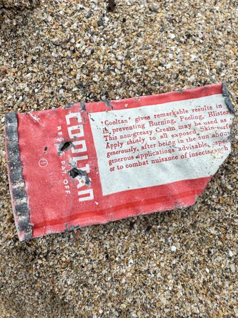 A beach cleaner found decades old litter on Fistral Beach including a 52 year old crisp packet a 1930s Cooltan tube and a lobster tag that travelled 3,000 miles highlighting ocean waste’s long life.