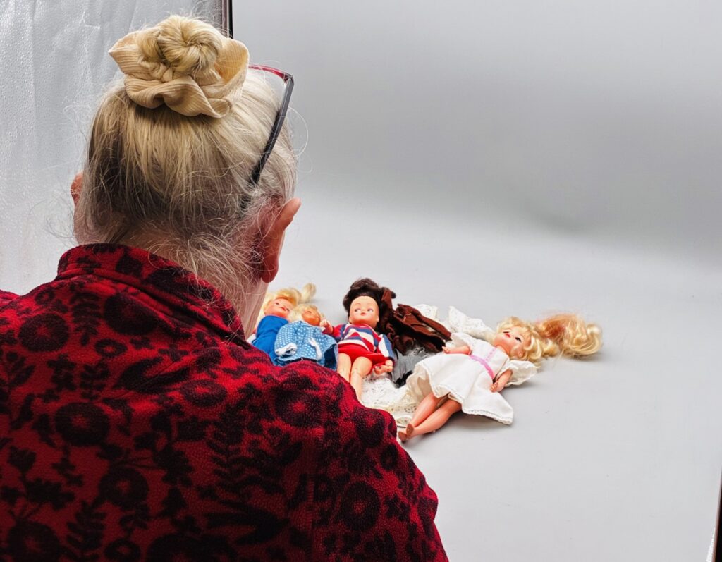 A charity shop worker was stunned when a vintage doll sold for hospice funds took a 5,000-mile detour to America before finally reaching its new home in Italy.
