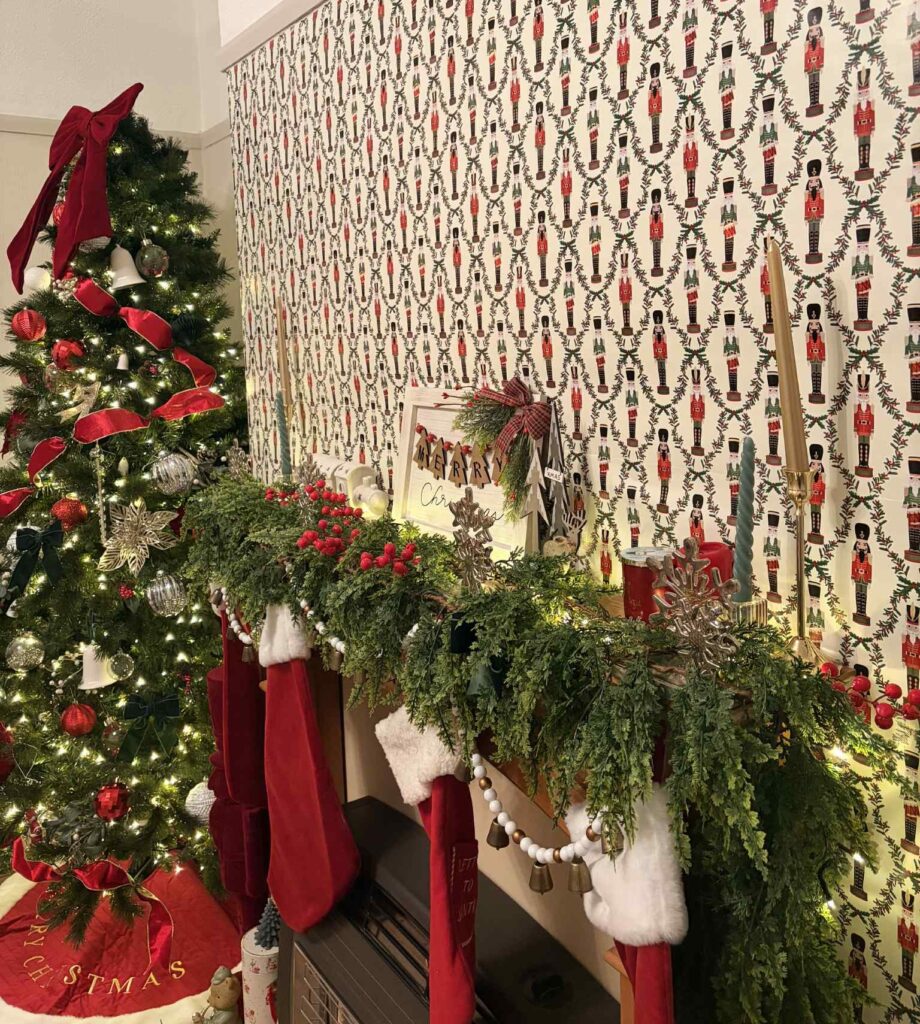 Naomis lounge turned into a Santas Grotto, after putting Christmas wrapping paper on the walls.