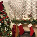 Naomi’s lounge turned into a Santa’s Grotto, after putting Christmas wrapping paper on the walls.