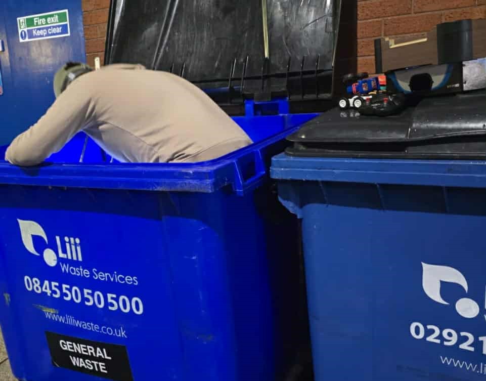 A dumpster diver from Portsmouth makes £600 a month rescuing valuable items like jewellery and designer bags from shop bins using a storage unit to hold his incredible finds.
