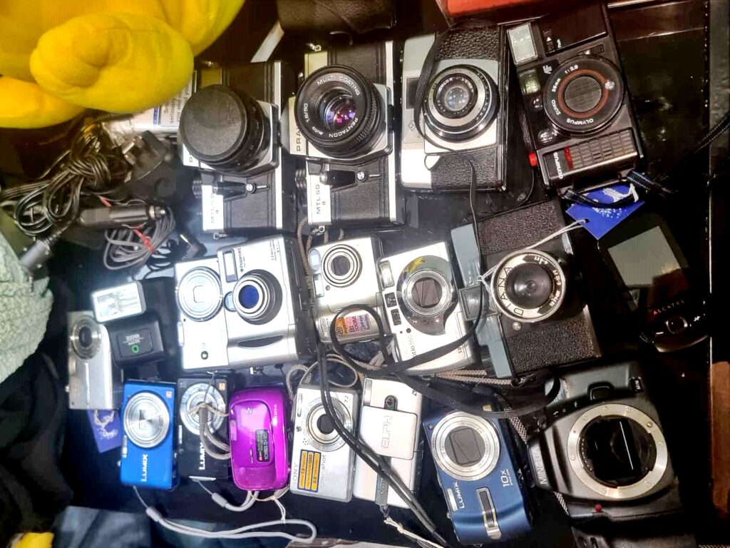 A dumpster diver from Portsmouth makes £600 a month rescuing valuable items like jewellery and designer bags from shop bins using a storage unit to hold his incredible finds.