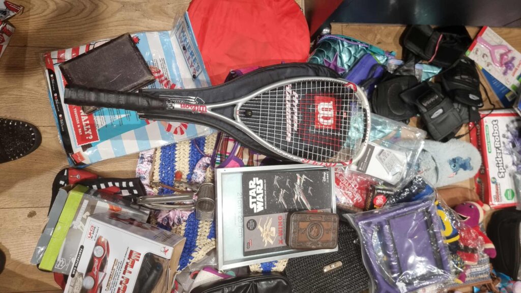 A dumpster diver from Portsmouth makes £600 a month rescuing valuable items like jewellery and designer bags from shop bins using a storage unit to hold his incredible finds.