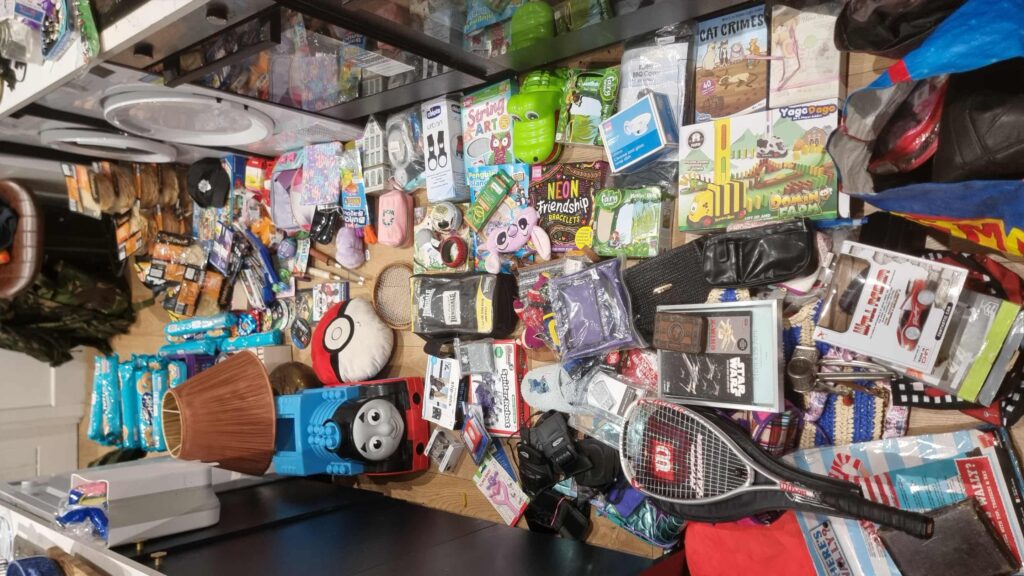 A dumpster diver from Portsmouth makes £600 a month rescuing valuable items like jewellery and designer bags from shop bins using a storage unit to hold his incredible finds.