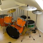 Ed Sheeran’s old orange drum kit, played and painted by him as a teen, is up for sale on eBay for £5,000 after being donated to charity and signed by the superstar.