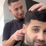 Football legend Eden Hazard shocks fans by swapping the pitch for the barber’s chair, giving trims at A Star Barbers after retiring with a £90m fortune.