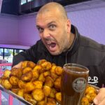 Foodie Jonny Adams tackled a 10,000 calorie roast potato challenge but quit after six minutes when the 4.5kg mountain of roasties left him bloated and sick for hours.
