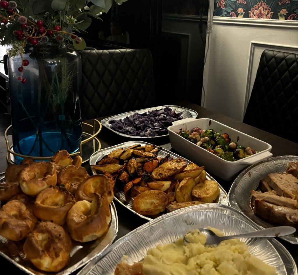 Frugal mum Charlene Woracker shows how to cook a full Christmas dinner for a family of four for just 10 pounds proving budget friendly festive meals can still be delicious and joyful.