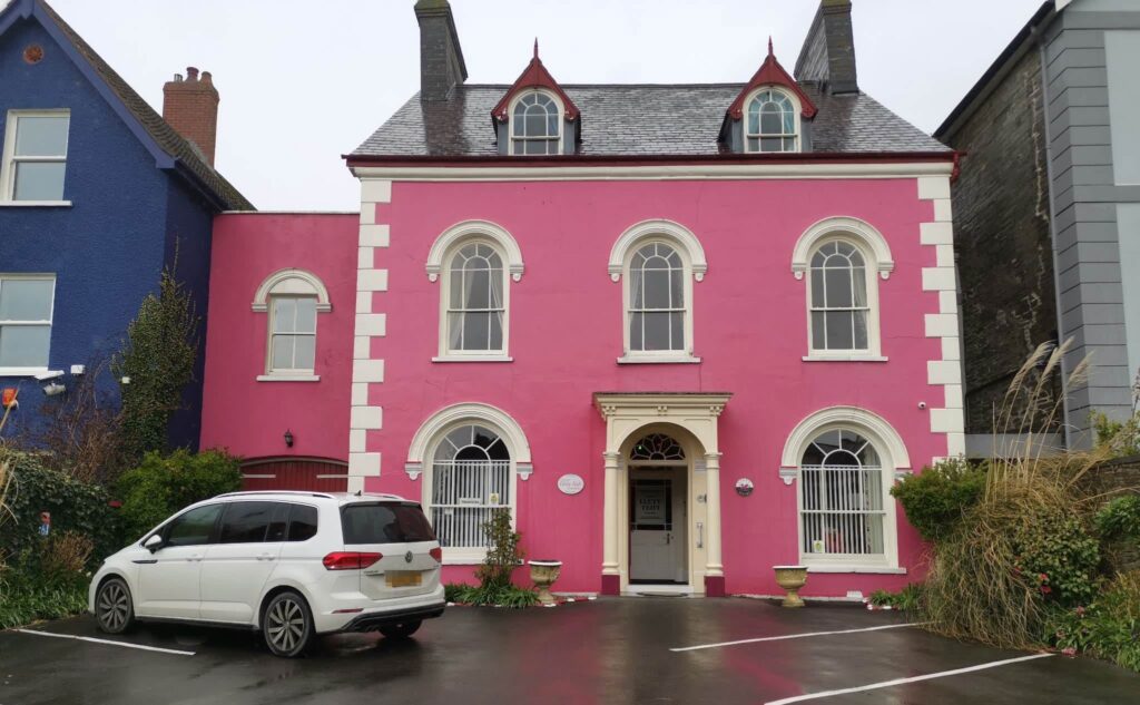 Creepy CCTV at a former prison turned B&B shows a shadowy figure seeming to walk through a wall leaving the owner and locals convinced the historic Cardigan guest house may be haunted.
