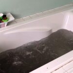 Woman horrified as filthy black water gushes from jacuzzi bath jets after first use in years. Sara Brown’s viral TikTok shocks viewers with the mouldy jacuzzi disaster.