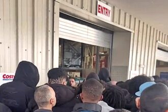 Crowds queued for hours outside Costco Wembley as chaos erupted over the Prismatic Evolutions Pokémon card bundle sparking frustration as shoppers feared resellers would spoil Christmas.
