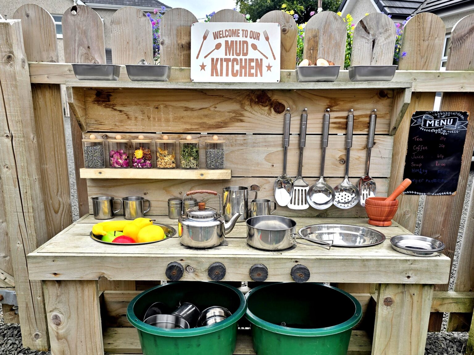Thrifty mum transforms her garden with a magical DIY mud kitchen for under 50 using Temu bargains creating an inspiring outdoor play space toddlers love without the hefty price tag.
