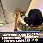 Adeline sharing footage of liquid suddenly leaking from an overhead locker mid-flight, from Korea to Singapore on Singapore Airlines