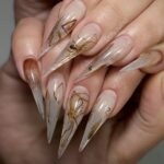 Manicurist with bug phobia horrified as client requests dead spiders in acrylic nails for art project, sparking viral debate after her shocking TikTok video hits 1 million views.