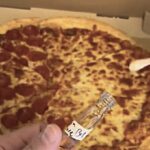A microbiologist’s pizza experiment shocks TikTok after revealing high bacteria on fresh pepperoni slices. Day-old pizza showed less growth, leaving viewers baffled but unfazed.