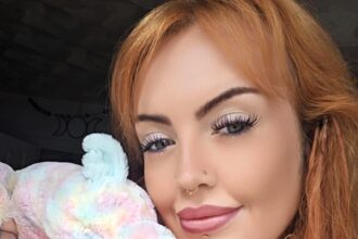 Hannah with a Jellycat cuddly toy.