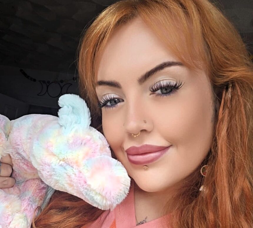 Hannah with a Jellycat cuddly toy.