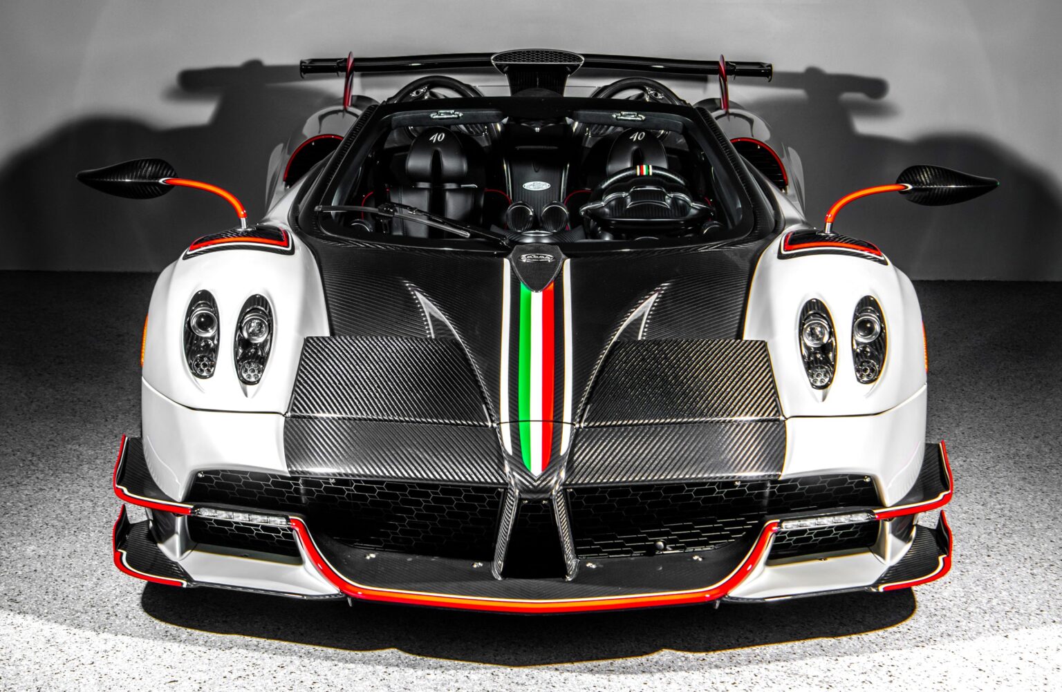 A rare 2020 Pagani Huayra Roadster BC Quaranta with just 75 miles is up for auction at £4.5m, a £1.6m profit in five years, boasting 800bhp and 238mph top speed.