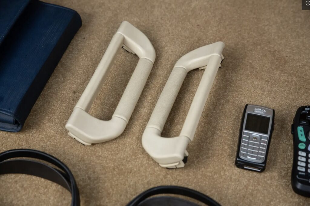 A 2007 Range Rover once owned by Queen Elizabeth II sold for £66,375 after restoration, featuring royal touches like corgi dog guards and links to Prince Philip and Sandringham.