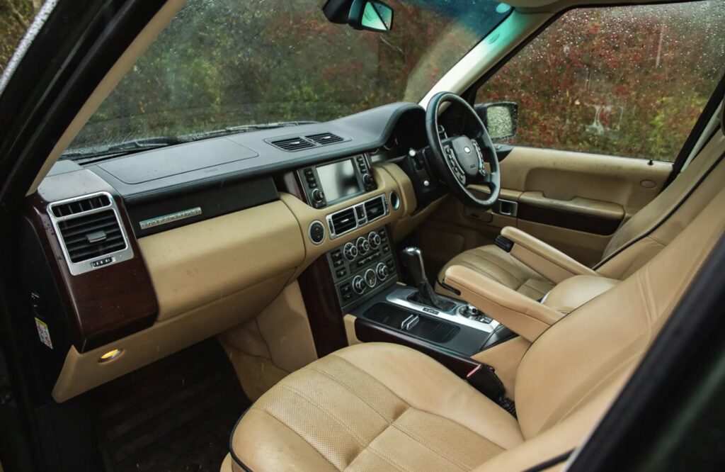 A 2007 Range Rover once owned by Queen Elizabeth II sold for £66,375 after restoration, featuring royal touches like corgi dog guards and links to Prince Philip and Sandringham.