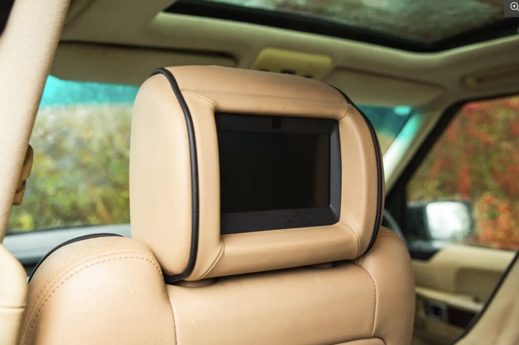 A 2007 Range Rover once owned by Queen Elizabeth II sold for £66,375 after restoration, featuring royal touches like corgi dog guards and links to Prince Philip and Sandringham.