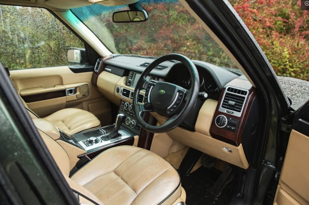 A 2007 Range Rover once owned by Queen Elizabeth II sold for £66,375 after restoration, featuring royal touches like corgi dog guards and links to Prince Philip and Sandringham.