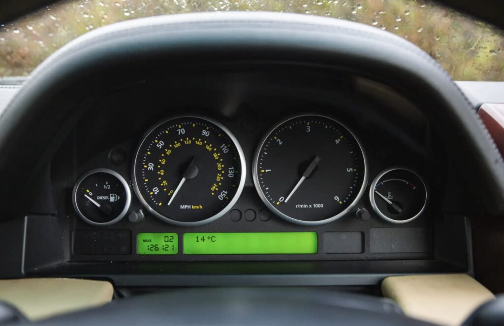 A 2007 Range Rover once owned by Queen Elizabeth II sold for £66,375 after restoration, featuring royal touches like corgi dog guards and links to Prince Philip and Sandringham.