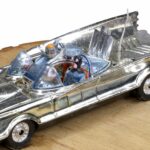 A rare gold Corgi Toys Batmobile from the 1960s is heading to auction, expected to fetch over £3,000, with collectors calling it one of the most sought-after Batman models ever.