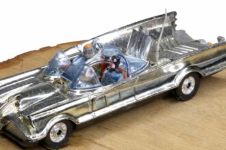 A rare gold Corgi Toys Batmobile from the 1960s is heading to auction, expected to fetch over £3,000, with collectors calling it one of the most sought-after Batman models ever.