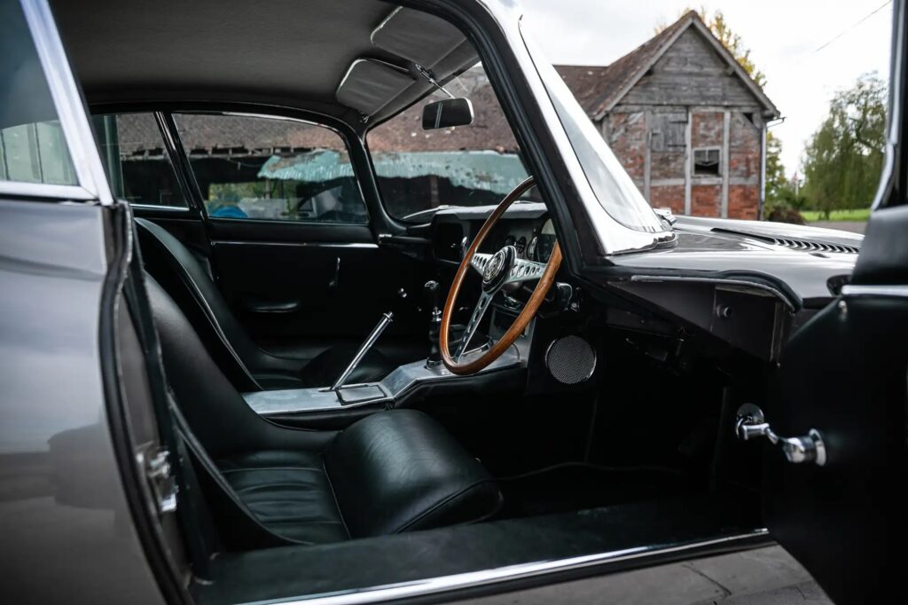Rowan Atkinson’s iconic Jaguar E-Type from Netflix’s Man vs Bee sold for £78,750 after being restored, combining classic British heritage with TV fame.