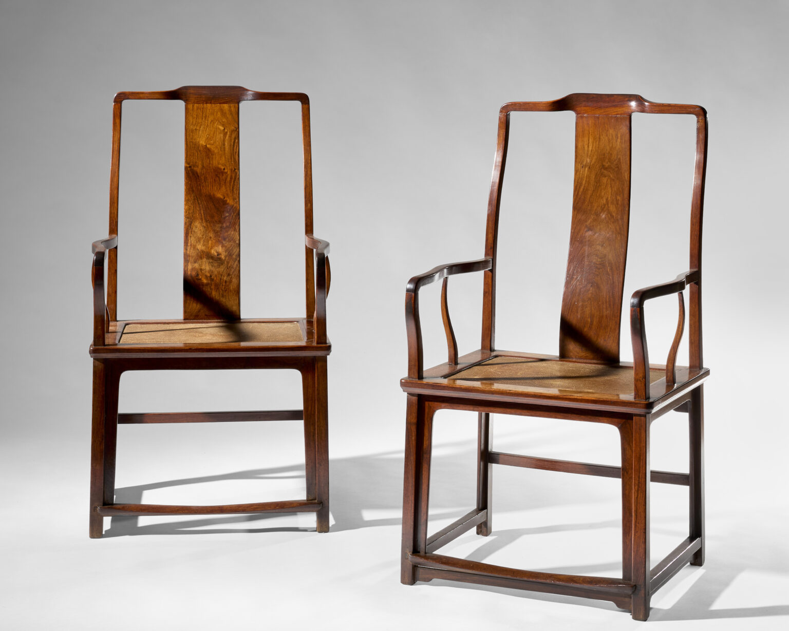 Two rare 17th century Chinese huanghuali armchairs owned by economist Solomon Adler, a friend of Chairman Mao, sold for £786,000 after a fierce bidding war at auction.
