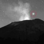 Mysterious glowing UFO caught on camera hovering over Mexico’s Popocatepetl volcano before zipping away. Experts say it could be linked to magnetic field phenomena.
